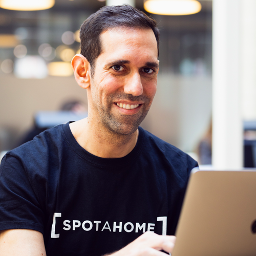 man wearing spotahome tshirt