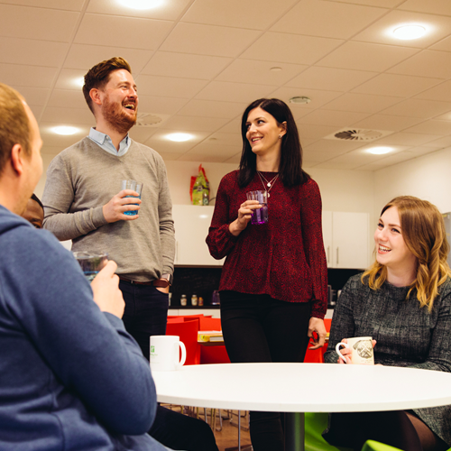 group of people smiling and laughing