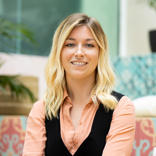 woman looking into camera smiling