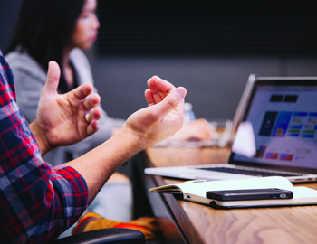 man gesturing with hands