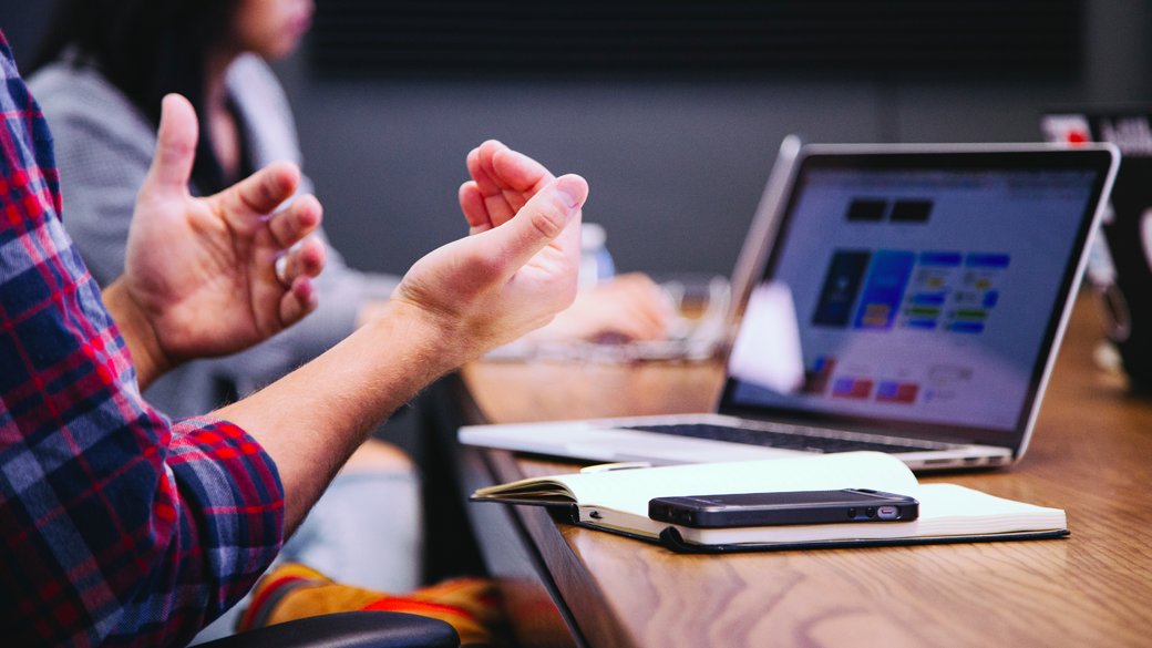 man gesturing with hands