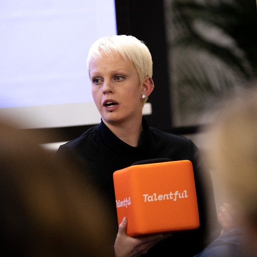 woman holding talentful cube