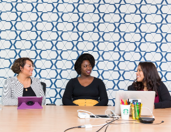 three women working