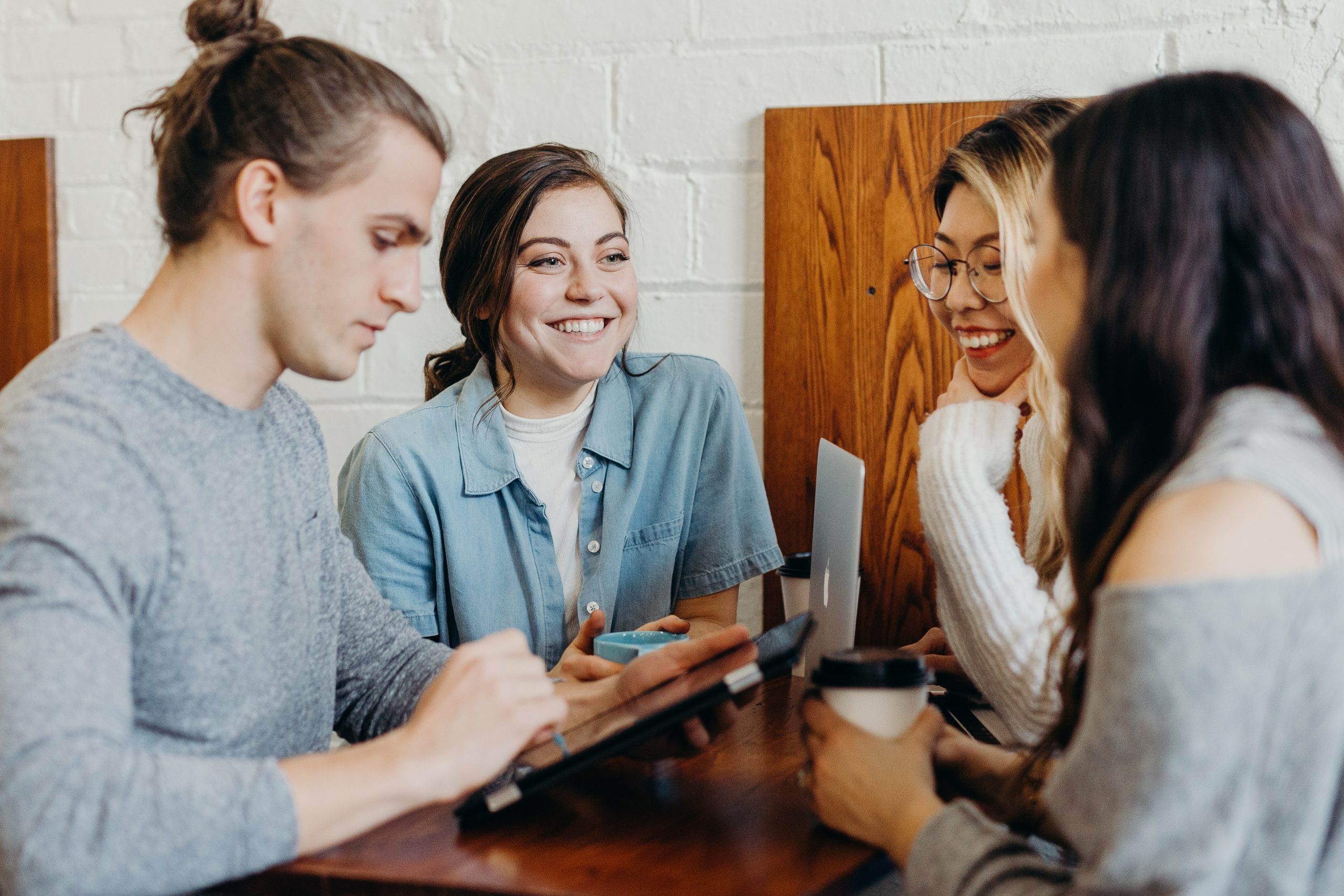 group of young people in a meeting