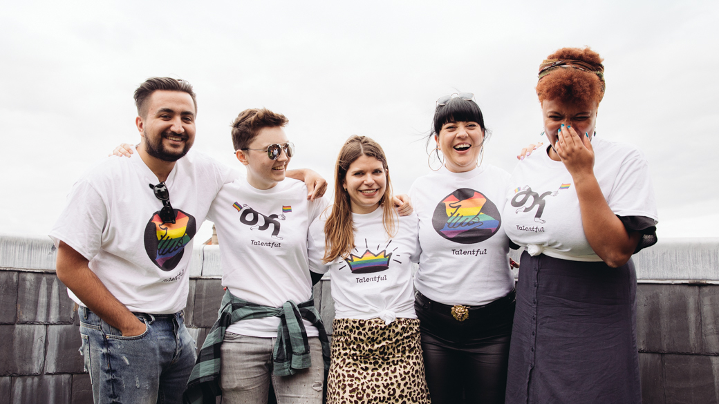 Talentful employees posing together for Pride